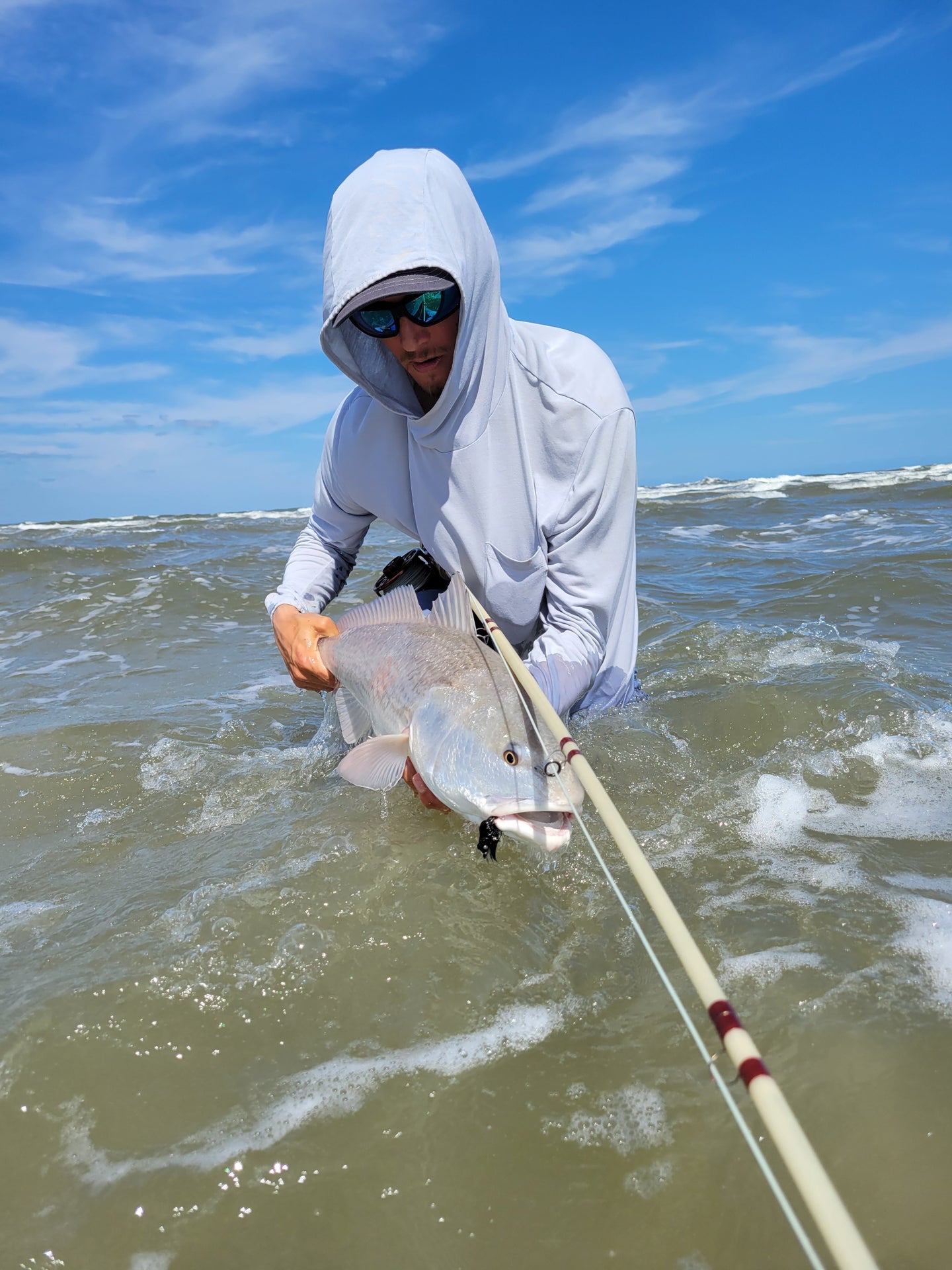 Fly fishing for redfish in the surf | Dedicated To The Smallest Of Skiffs